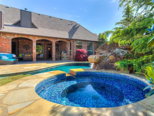 view of swimming pool with a fenced in pool, an in ground hot tub, an outdoor living space, and a patio area