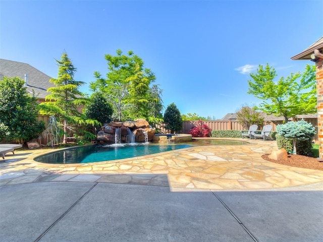 view of swimming pool with a fenced backyard, a fenced in pool, and a patio