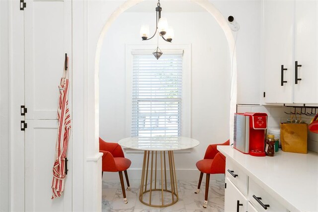 1428 NW 45th St, Oklahoma City, OK 73118 - dining space featuring marble finish floor and baseboards