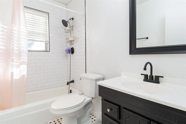 1428 NW 45th St, Oklahoma City, OK 73118 - bathroom with toilet, vanity, and shower / tub combo with curtain