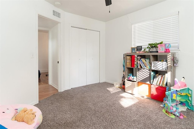 1428 NW 45th St, Oklahoma City, OK 73118 - rec room featuring ceiling fan, baseboards, visible vents, and carpet