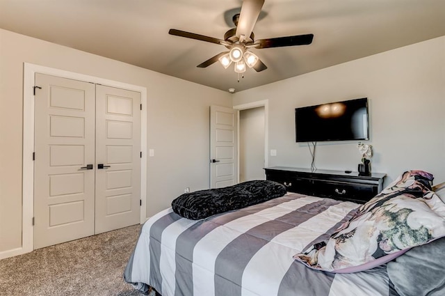 1219 N Adair Ct, Stillwater, OK 74075 - carpeted bedroom with a closet and a ceiling fan