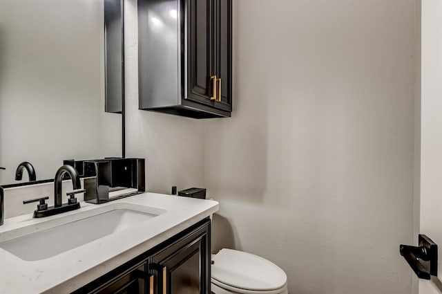 1219 N Adair Ct, Stillwater, OK 74075 - half bathroom featuring toilet and vanity