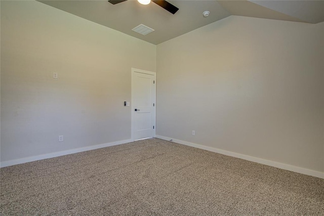 4980 12th Ave, Goldsby, OK 73093 - empty room featuring a ceiling fan, carpet floors, vaulted ceiling, baseboards, and a smoke detector