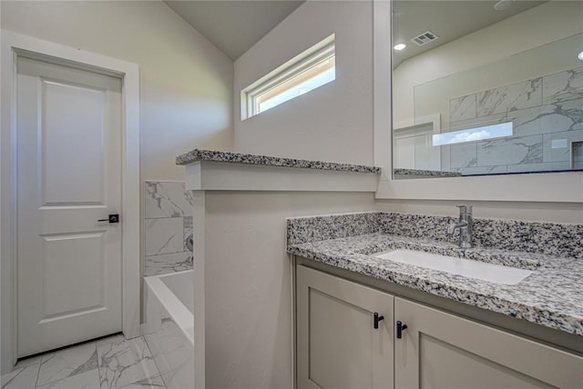 4980 12th Ave, Goldsby, OK 73093 - bathroom with marble look tile flooring, vanity, a shower, a bathtub, and lofted ceiling