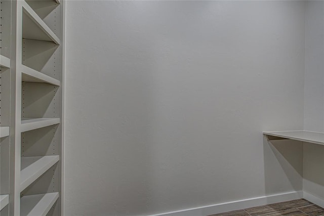 4980 12th Ave, Goldsby, OK 73093 - spacious closet with wood finished floors