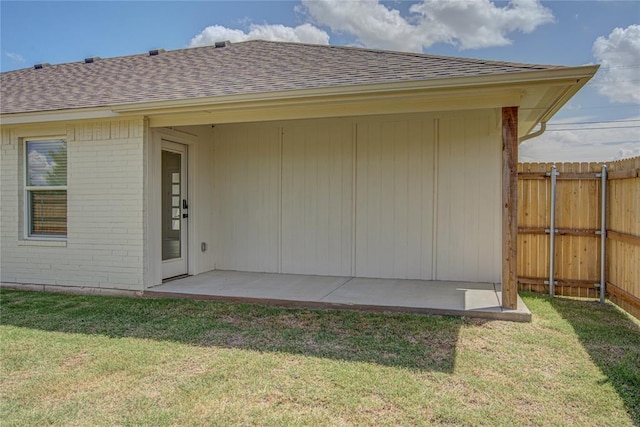 4980 12th Ave, Goldsby, OK 73093 - rear view of property featuring a shingled roof and brick siding