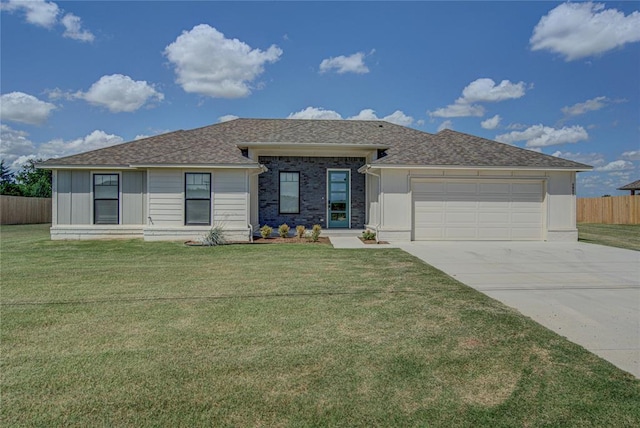 4980 12th Ave, Goldsby, OK 73093 - view of front of house featuring driveway, a garage, and a shingled roof