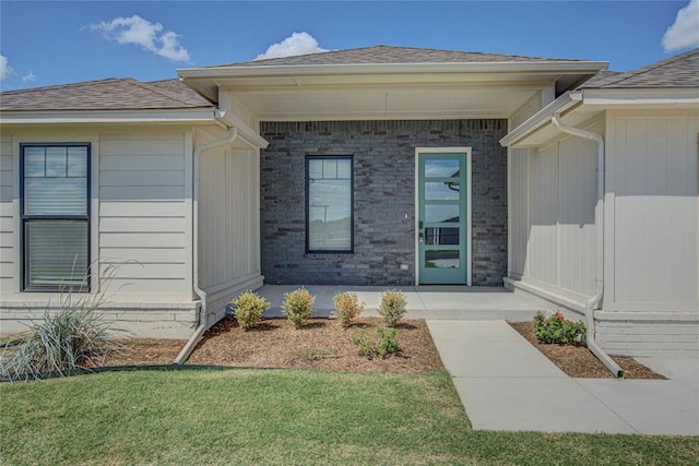 4980 12th Ave, Goldsby, OK 73093 - doorway to property with a shingled roof