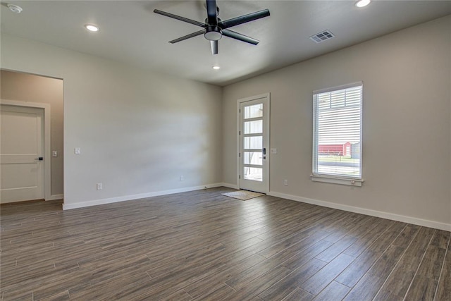4980 12th Ave, Goldsby, OK 73093 - unfurnished room featuring dark wood finished floors, ceiling fan, baseboards, a smoke detector, and recessed lighting