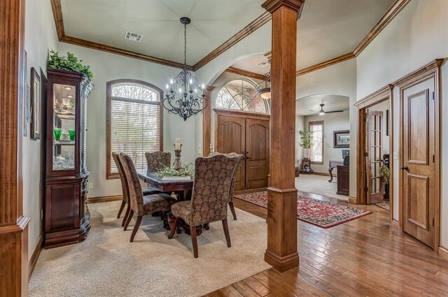 3615 S Scissortail Dr, Stillwater, OK 74074 - dining area with a notable chandelier, visible vents, baseboards, and a healthy amount of sunlight