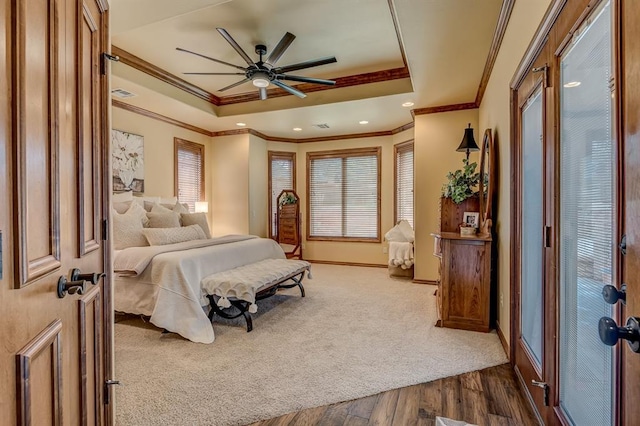 3615 S Scissortail Dr, Stillwater, OK 74074 - bedroom with a raised ceiling, ornamental molding, and visible vents