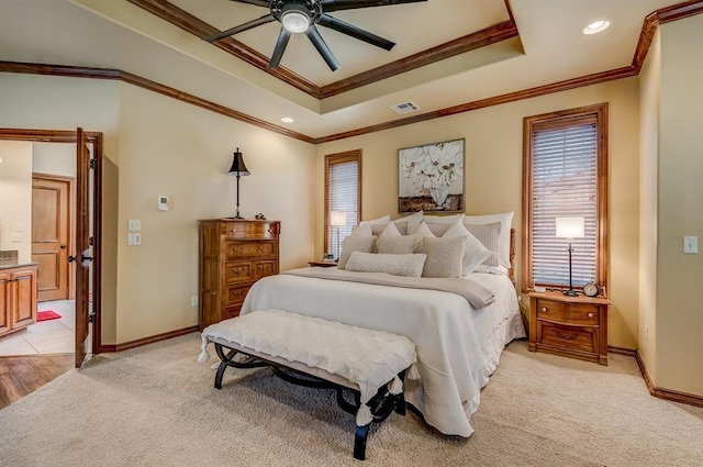3615 S Scissortail Dr, Stillwater, OK 74074 - bedroom with a raised ceiling, light carpet, crown molding, and baseboards