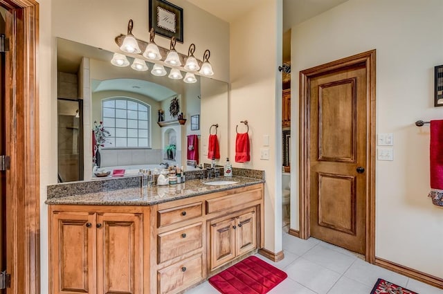 3615 S Scissortail Dr, Stillwater, OK 74074 - bathroom with toilet, vanity, and tile patterned flooring