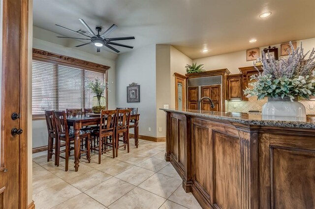 3615 S Scissortail Dr, Stillwater, OK 74074 - dining area featuring recessed lighting, light tile patterned floors, baseboards, and a ceiling fan