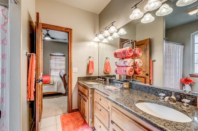 3615 S Scissortail Dr, Stillwater, OK 74074 - full bathroom with tile patterned floors, double vanity, ensuite bathroom, and a sink
