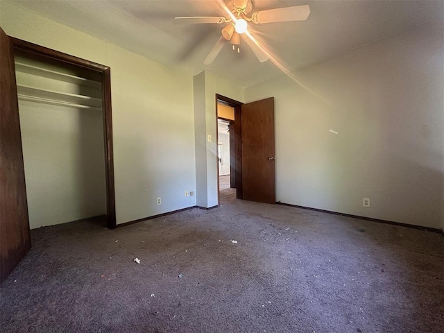 unfurnished bedroom with carpet floors, a closet, a ceiling fan, and baseboards