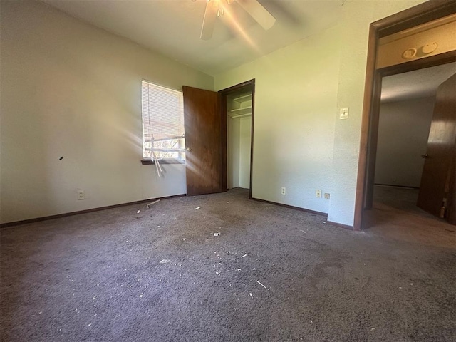 unfurnished bedroom featuring ceiling fan, carpet floors, and baseboards