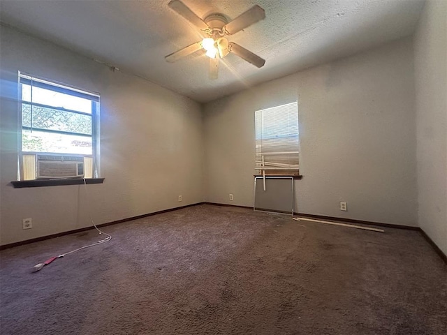 unfurnished room featuring cooling unit, a ceiling fan, baseboards, and carpet