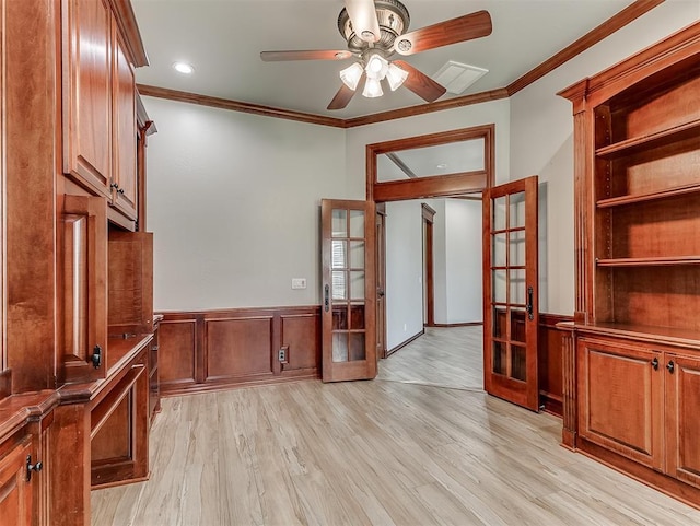1217 Camelot Dr, Yukon, OK 73099 - interior space with wainscoting, french doors, ceiling fan, and crown molding