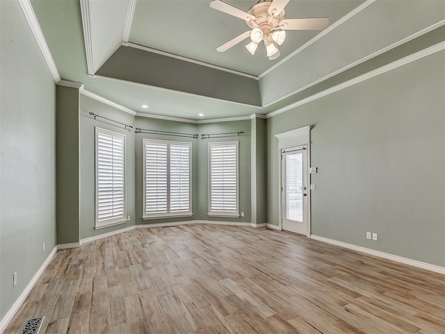 1217 Camelot Dr, Yukon, OK 73099 - empty room featuring a ceiling fan, crown molding, light wood-type flooring, baseboards, and visible vents