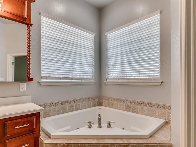 1217 Camelot Dr, Yukon, OK 73099 - bathroom with vanity and a tub with jets