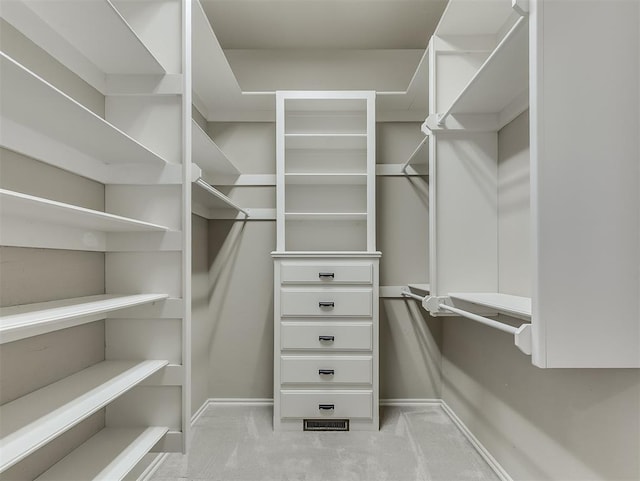 1217 Camelot Dr, Yukon, OK 73099 - spacious closet featuring light colored carpet