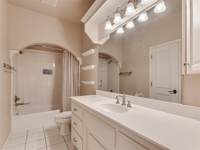 1217 Camelot Dr, Yukon, OK 73099 - full bath featuring shower / bath combo, vanity, tile patterned flooring, and toilet