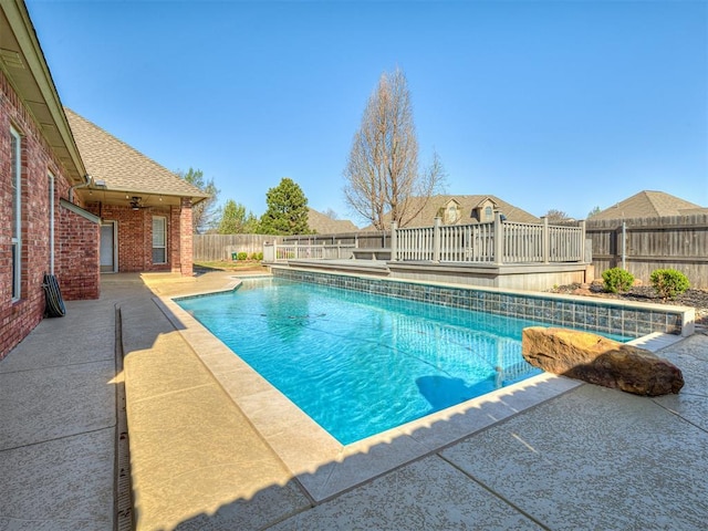 1217 Camelot Dr, Yukon, OK 73099 - view of pool featuring a fenced backyard, a fenced in pool, and a patio