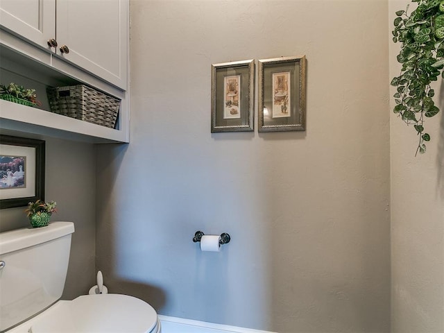 bathroom featuring toilet