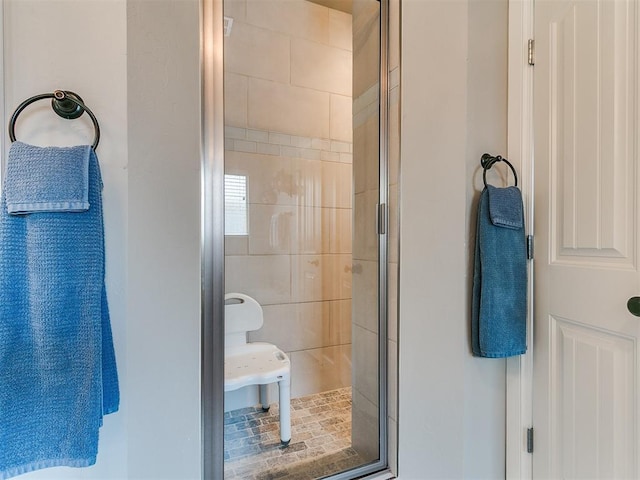 bathroom featuring a stall shower