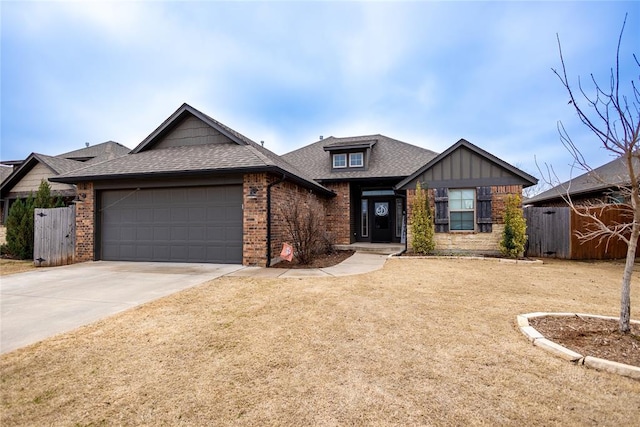 9908 SW 22nd St, Yukon, OK 73099 - view of front of house with brick siding, a garage, concrete driveway, and a shingled roof