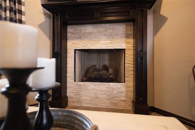 9908 SW 22nd St, Yukon, OK 73099 - detailed view of a fireplace and wood finished floors