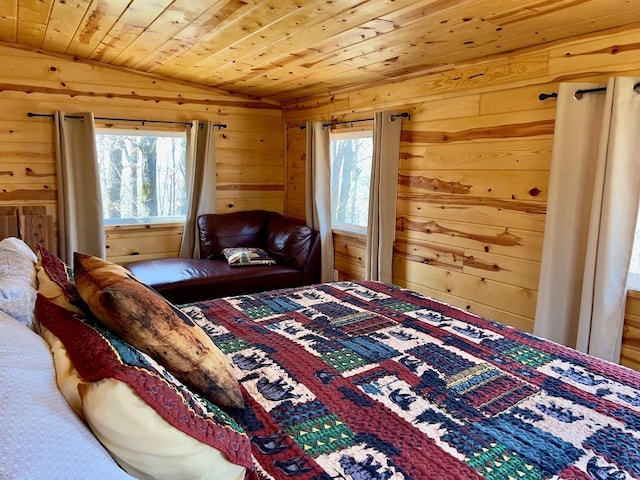 bedroom with wood walls, wood ceiling, and lofted ceiling