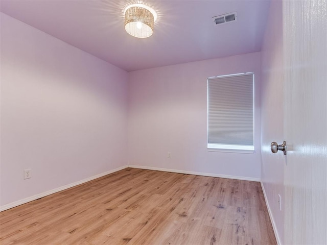 1801 NW 145th St, Edmond, OK 73013 - unfurnished room with visible vents, light wood finished floors, and baseboards