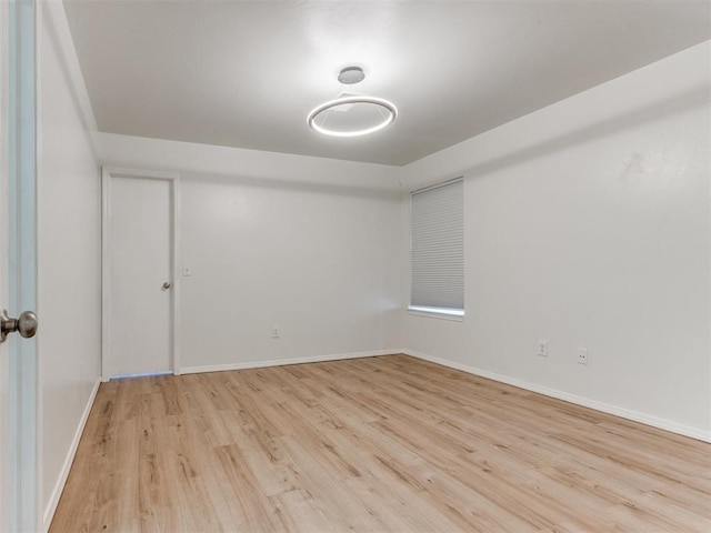1801 NW 145th St, Edmond, OK 73013 - empty room with baseboards and wood finished floors