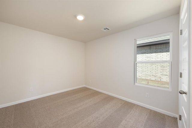 2416 Kathleens Xing, Yukon, OK 73099 - carpeted spare room featuring baseboards