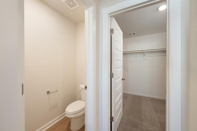 2416 Kathleens Xing, Yukon, OK 73099 - bathroom with toilet and baseboards