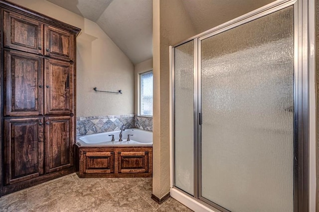 9609 Lakecrest Dr, Oklahoma City, OK 73159 - bathroom featuring a garden tub, a stall shower, a textured wall, and lofted ceiling