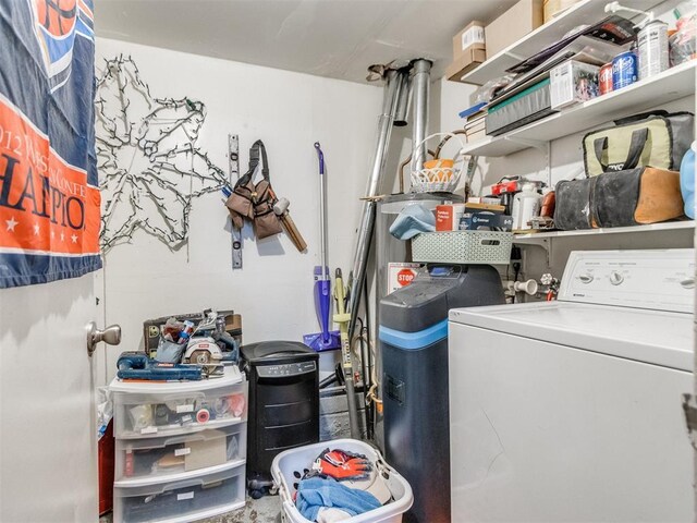 laundry room featuring washer / dryer and laundry area