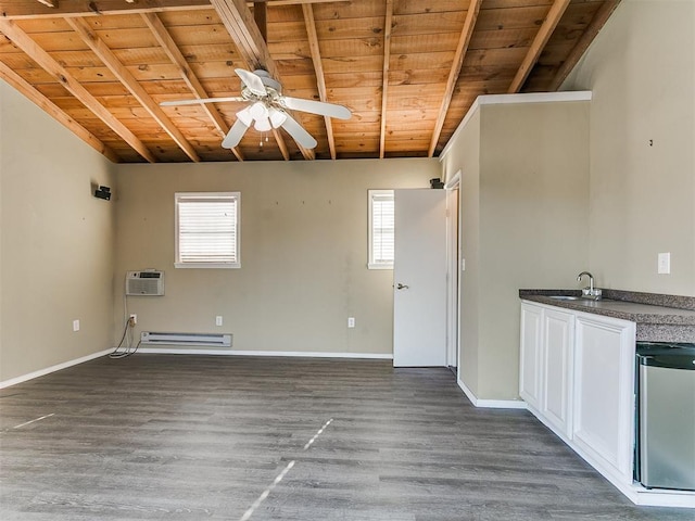 9333 SW 22nd St, Oklahoma City, OK 73128 - spare room with wood finished floors, a ceiling fan, wooden ceiling, a baseboard heating unit, and beam ceiling