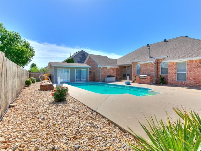 9333 SW 22nd St, Oklahoma City, OK 73128 - view of swimming pool featuring a fenced backyard, a fenced in pool, and a patio