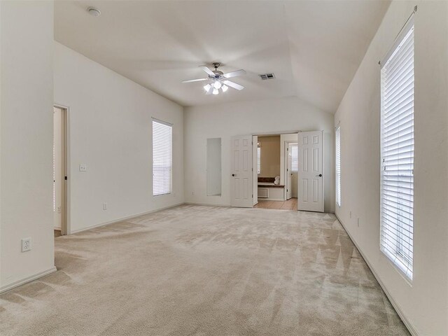 9333 SW 22nd St, Oklahoma City, OK 73128 - empty room featuring ceiling fan, light carpet, visible vents, and plenty of natural light