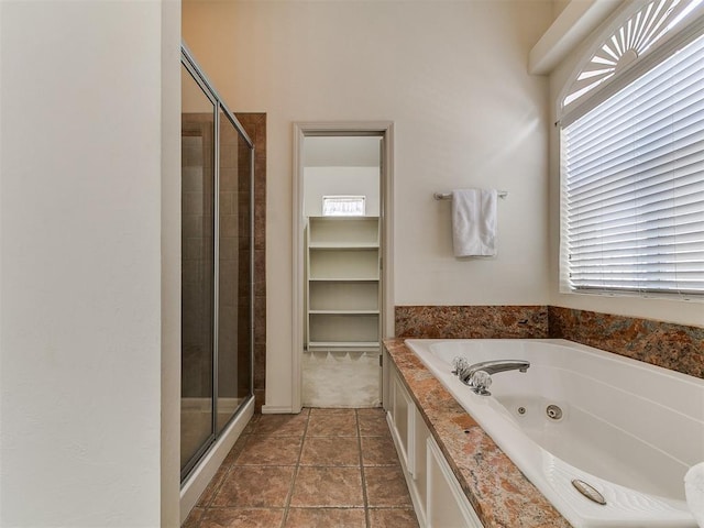 9333 SW 22nd St, Oklahoma City, OK 73128 - full bath with a healthy amount of sunlight, a jetted tub, and a stall shower