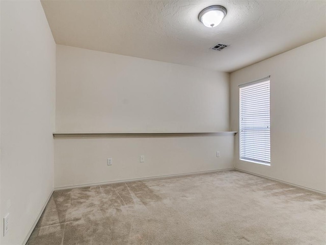 9333 SW 22nd St, Oklahoma City, OK 73128 - unfurnished room with baseboards, carpet flooring, and visible vents