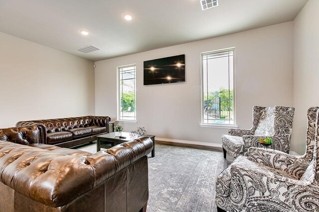 1117 SW 139th St, Oklahoma City, OK 73170 - living room featuring baseboards, visible vents, and recessed lighting