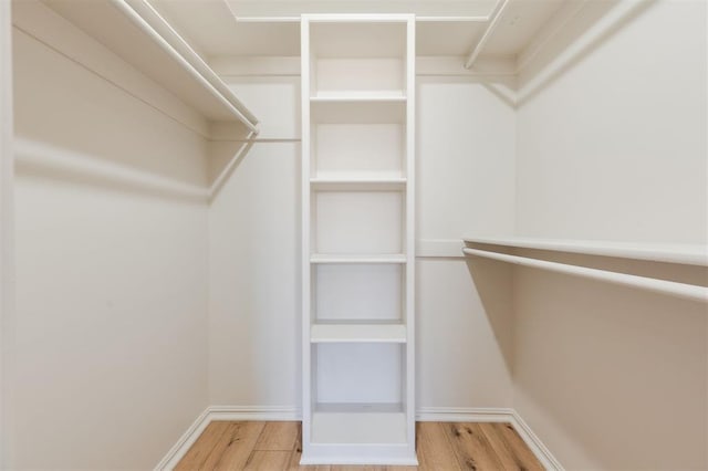 2501 NW 121st St, Oklahoma City, OK 73120 - walk in closet featuring light wood-style flooring