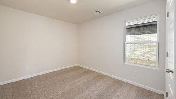 1209 E Stetson Ln, Mustang, OK 73064 - carpeted empty room with visible vents and baseboards