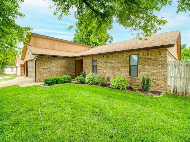 1520 NE 2nd St, Moore, OK 73160 - ranch-style house featuring a garage, fence, a front lawn, brick siding, and driveway
