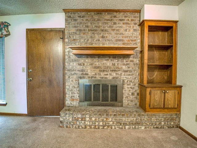 1520 NE 2nd St, Moore, OK 73160 - unfurnished living room with a fireplace, a textured ceiling, carpet floors, and baseboards
